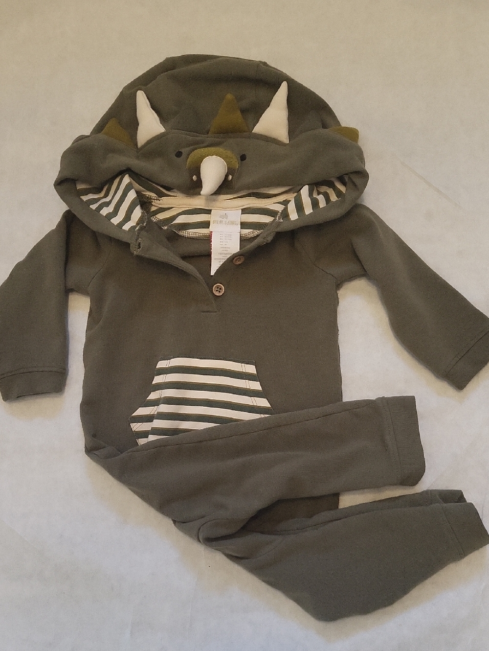Triceratops hooded footless baby romper in olive green